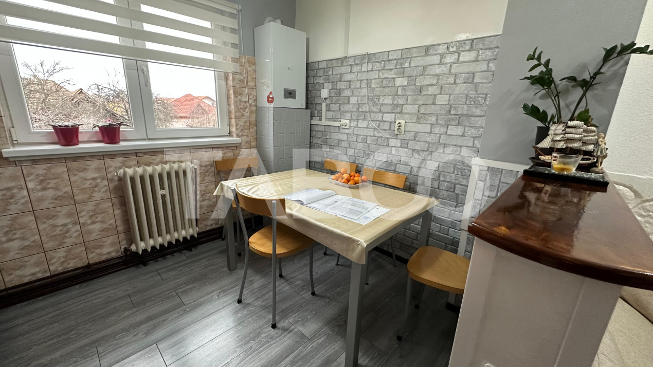 Apartament 4 camere  la casa cu curte pivnita zona Lazaret Sibiu
