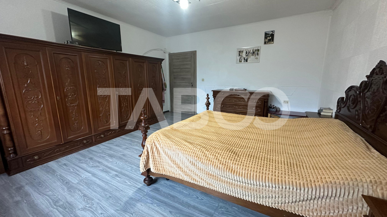 Apartament 4 camere  la casa cu curte pivnita zona Lazaret Sibiu