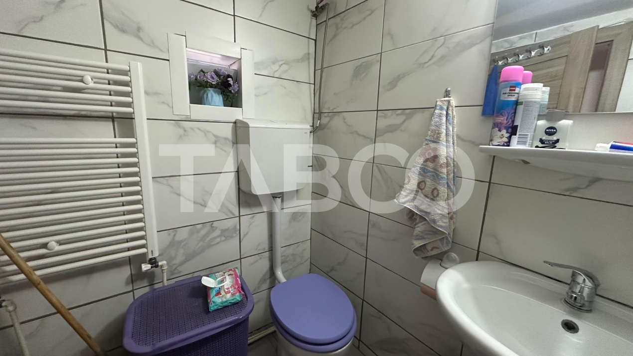 Apartament 4 camere  la casa cu curte pivnita zona Lazaret Sibiu