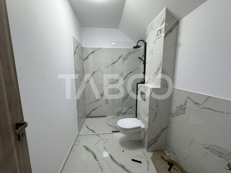 Apartament cu 4 camere 2 bai 84 mpu balcon 18 mp loc parcare Sibiu