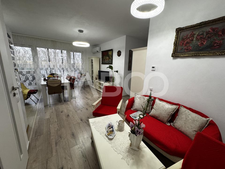 Apartament cu gradina de 63 mp 3 camere 2 parcari boxa Turnisor Sibiu