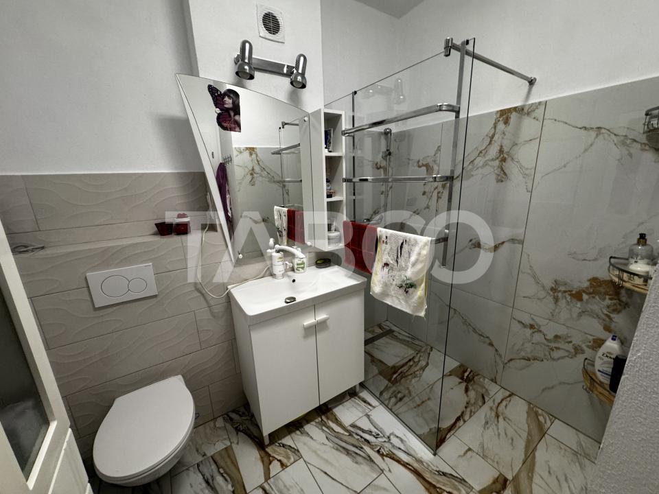 Apartament cu gradina de 63 mp 3 camere 2 parcari boxa Turnisor Sibiu