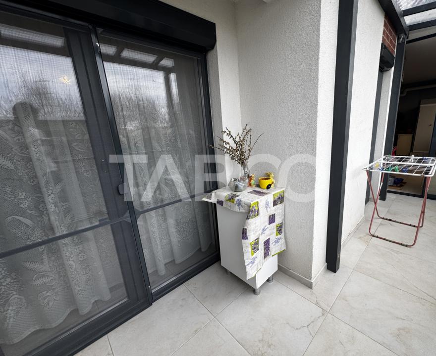Apartament cu gradina de 63 mp 3 camere 2 parcari boxa Turnisor Sibiu