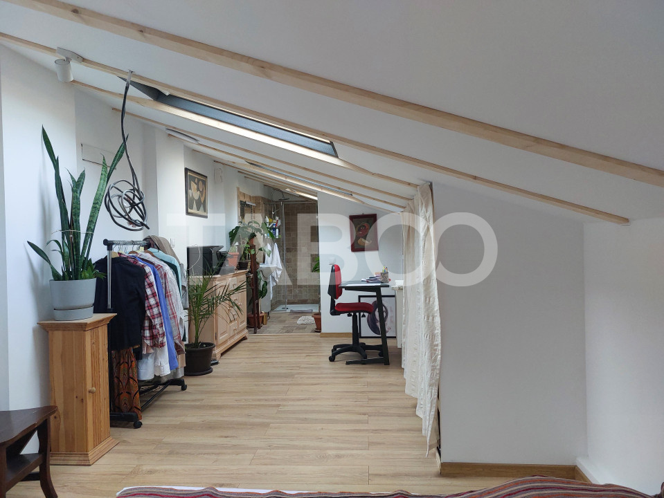 Apartament de vanzare 105 mp 3 camere curte 340 mp in acte Cisnadie