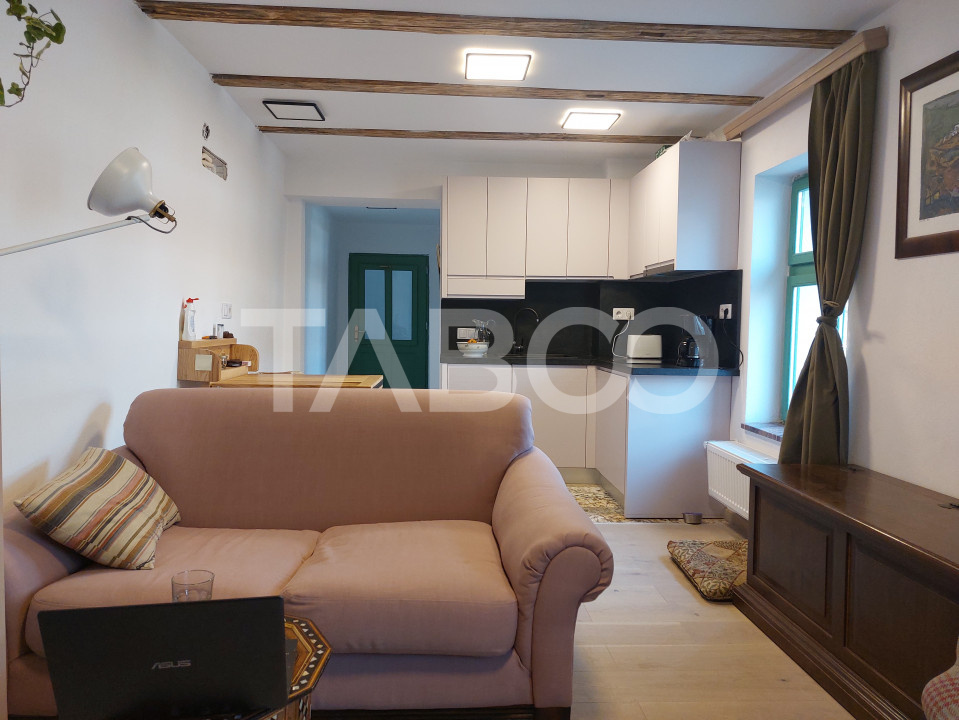 Apartament de vanzare 105 mp 3 camere curte 340 mp in acte Cisnadie