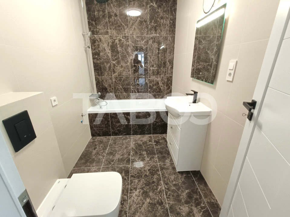 Apartament de vanzare cu 3 camere 2 bai si 2 balcoane in Sibiu