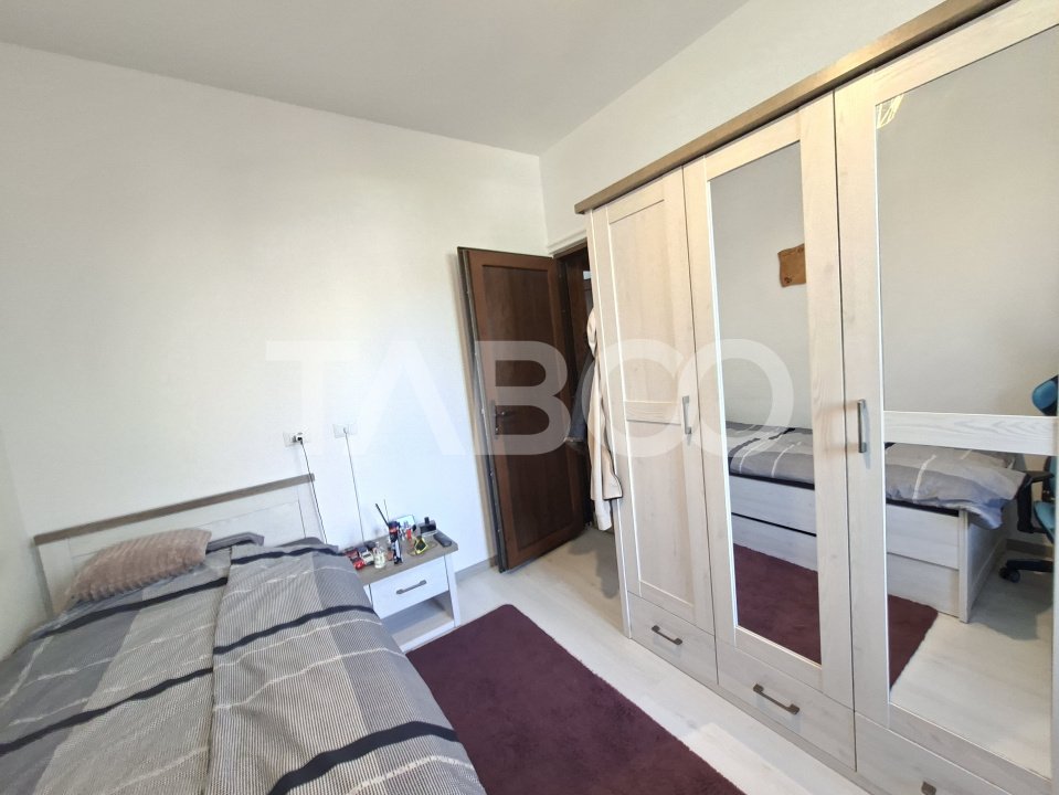Apartament de vanzare cu 3 camere cu gradina de 85 mp si 2 parcari