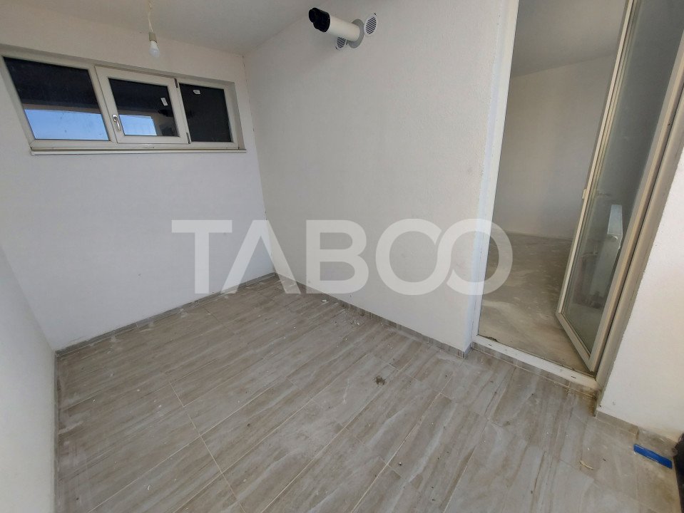 Apartament decomandat de vanzare 52mpu 2 camere 2 logii loc parcare