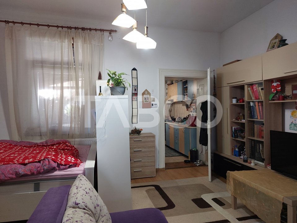 Apartament la curte 3 camere 59 mp pivnita gradina 60 mp Cisnadie