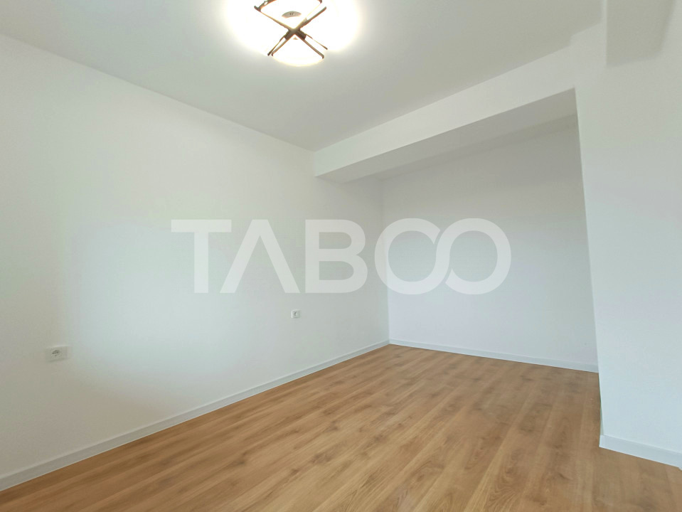 Apartament spatios 3 camere 2 bai - incalzire pardosea - parcare