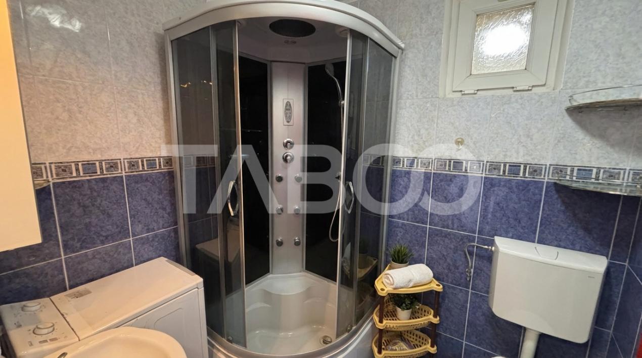 Garsoniera 33mpu de vanzare + parcare si curte privata