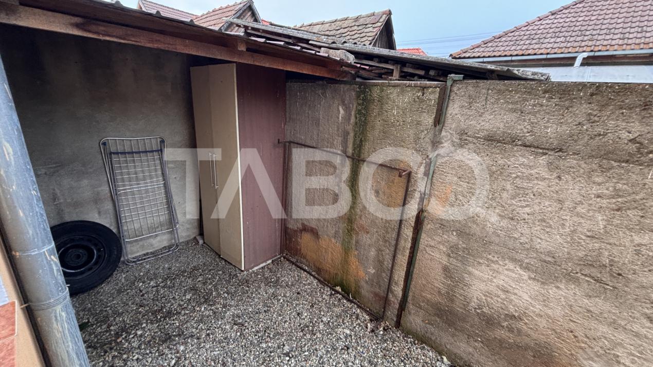 Garsoniera 33mpu de vanzare + parcare si curte privata