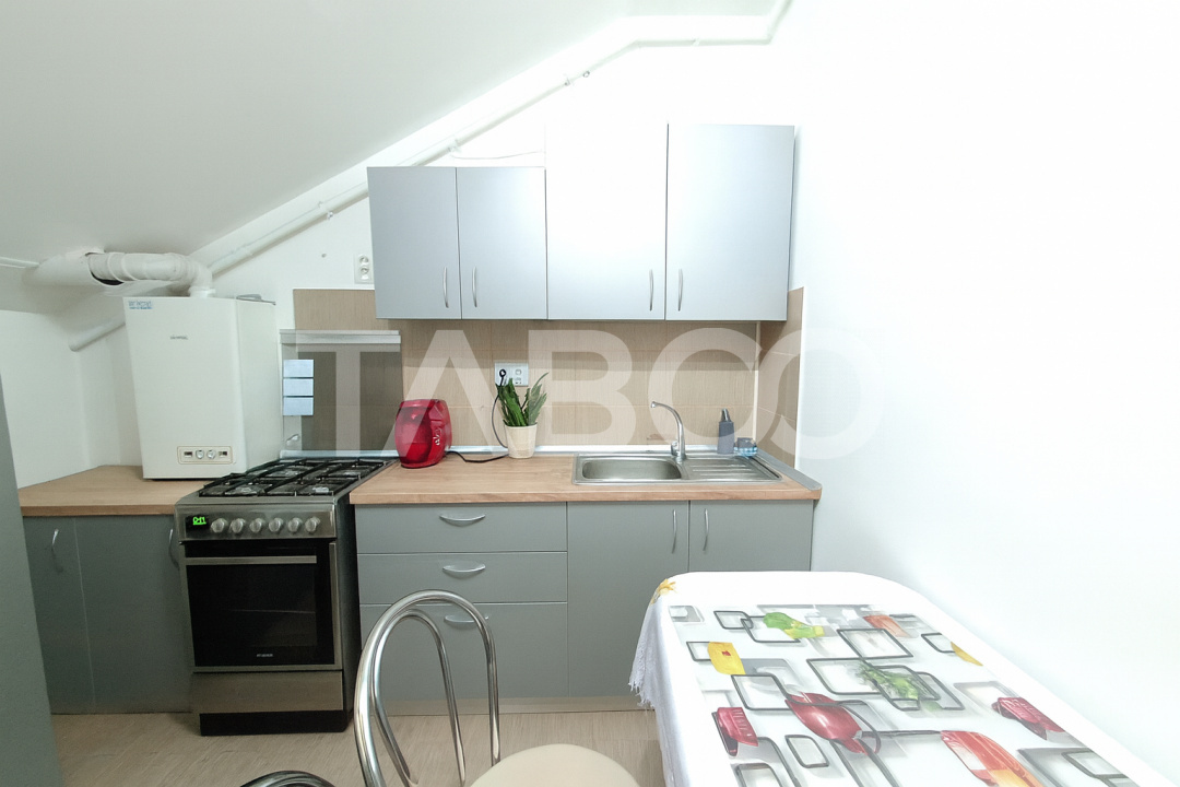 Garsoniera decomandata de vanzare balcon parcare Alma Turnisor